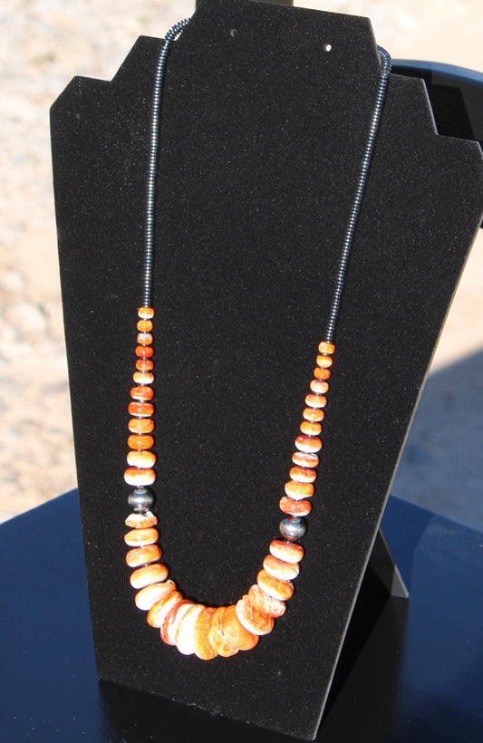 23 inch Graduated Orange Spiny Necklace with Sterling Silver Pearls