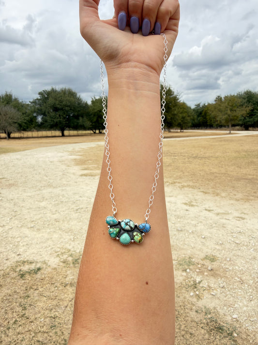 Multi stone half cluster necklace